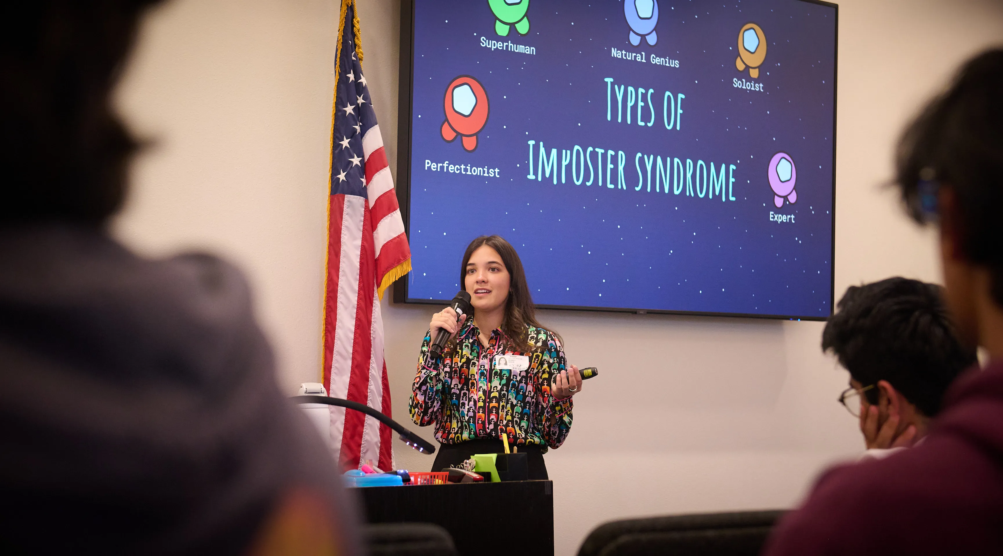 Aubrey Baker engaging with high school students during a STEM outreach session at FISD Career and Technology Center