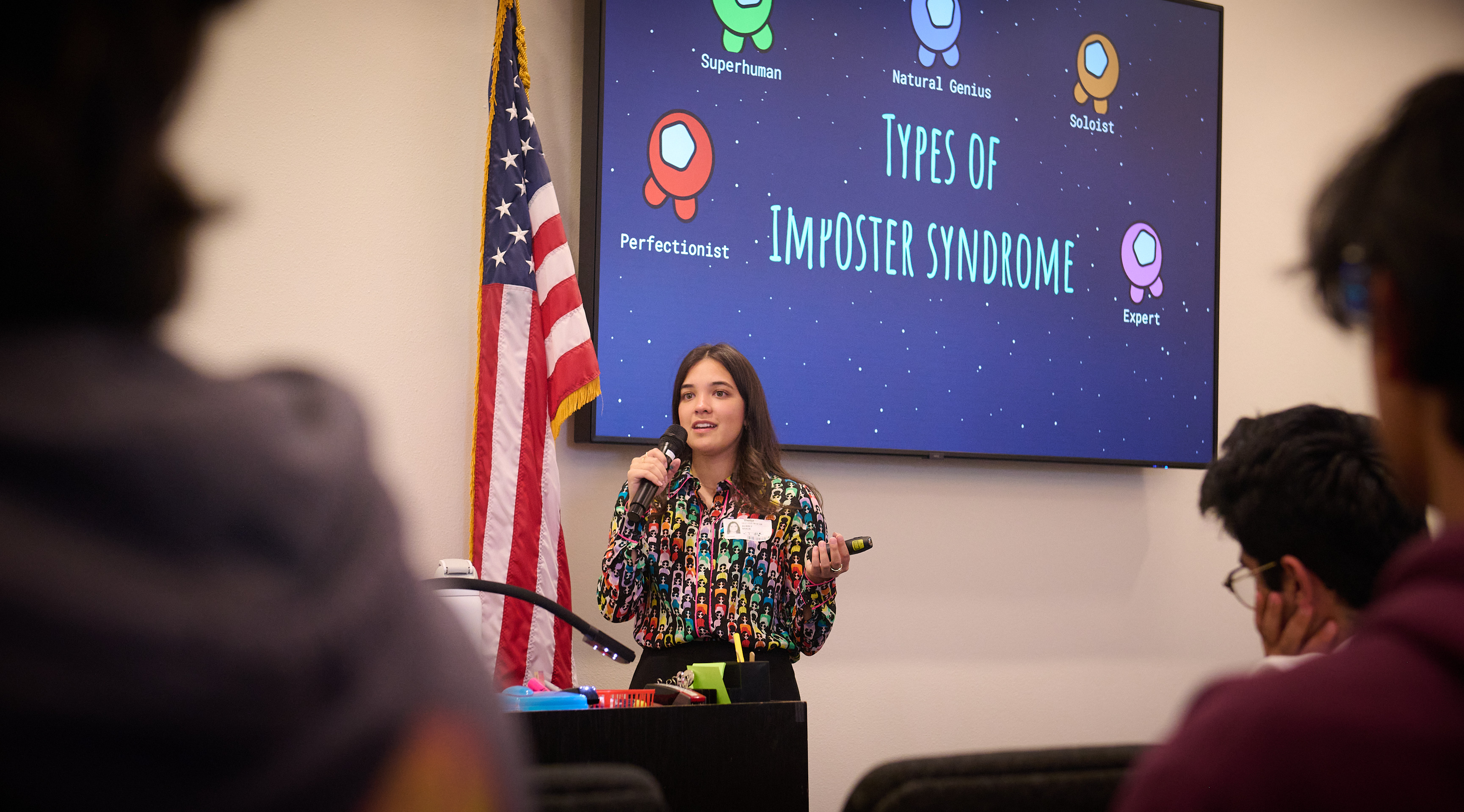 Aubrey Baker engaging with high school students during a STEM outreach session at FISD Career and Technology Center